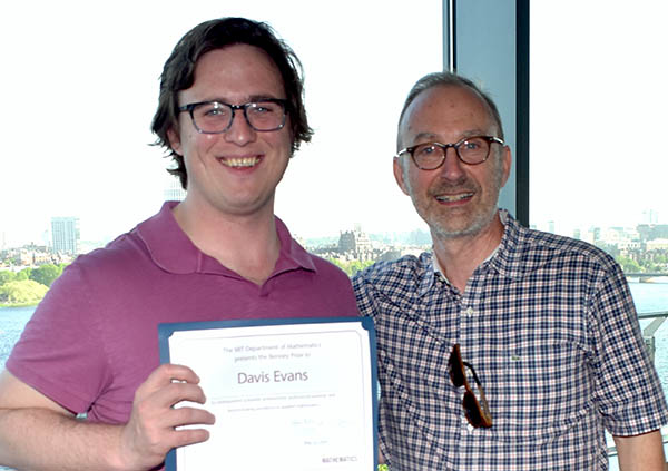 Davis Evans holding Benney Prize